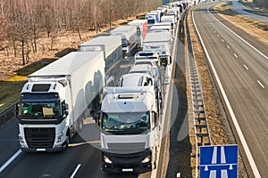 Lorry truck stack in long traffic jam on lane