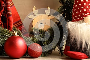 Red Christmas Balls and Wooden Reindeer photo