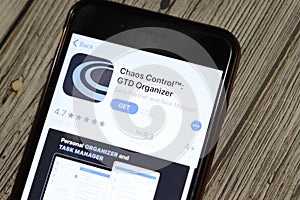 Los Angeles, California, USA - 28 November 2019: Chaos Control GTD Organizer app icon on mobile phone screen top view,