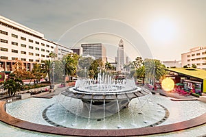 Los Angeles City Hall building behind water fountain at Grand Park