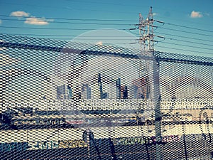 Los Angeles downtown seen thru the metal fence