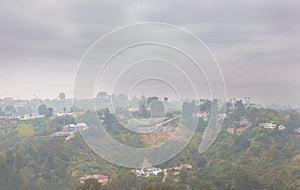 Los Angeles in the Fog The Magic of City Contours Foggy morning landscape picturesque houses on the hills