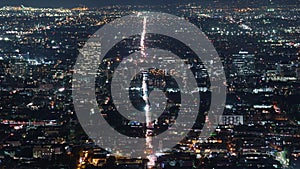 Los Angeles Night Skyline Telephoto from Griffith Park Time Lapse Tilt Down California USA