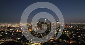 Los Angeles skyline aerial drone night downtown. Aerial shot of downtown Los Angeles skyscrapers at night. City lights