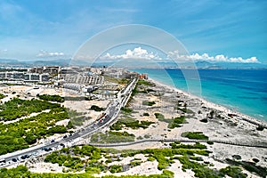 Los Arenales del Sol seaside during sunny summer day. Spain photo