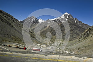 Los Caracoles desert highway, with many curves, in the Andes mountains