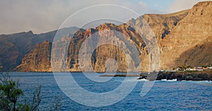 Los Gigantes cliffs. Sunset on Tenerife, Canary Islands, Spain. Volcanic rocky seaside resort in the Canary Islands.