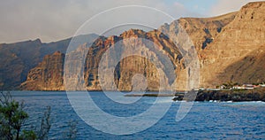 Los Gigantes cliffs. Sunset on Tenerife, Canary Islands, Spain. Volcanic rocky seaside resort in the Canary Islands.