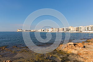Los Locos Torrevieja Spain view across bay to beach and holiday appartment buildings photo