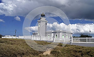 Los Morrillos Lighthouse in Cabo Rojo, coast of Ponce, Puerto Rico photo