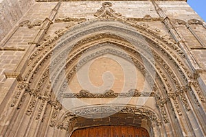 Los Novios door of the Cathedral of Palencia, Castilla y Leon, S photo