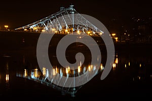 The Loschwitzer bridge over the river Elbe in Dresden at night.