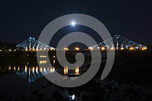 The Loschwitzer bridge over the river Elbe in Dresden at night.