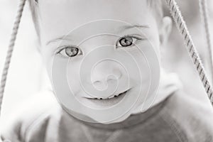 ÃÂ¡lose-up black and white portrait of a cute boy photo
