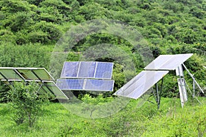 lose-up of Solar cell farm power plant eco technology. landscape of Solar cell panels in forest and farmland. photo