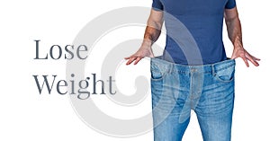 Lose weight text and man with oversized jeans photo