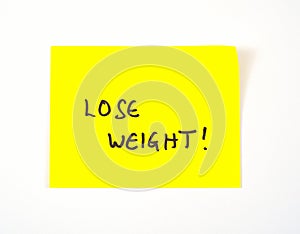 'Lose Weight' written on a sticky note