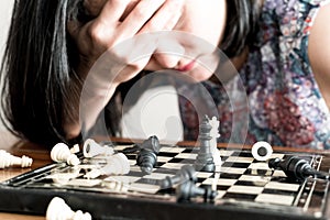 The loser women sad after fighting the chess, committed, competition, winner, successful, dedicate concept