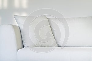 Loseup cushion pillow on a sofa or couch or armchair in a living room
