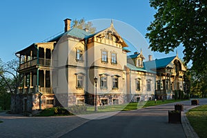Old manor in Loshitsa park in summer, Minsk, Belarus