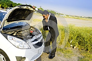 Lost businessman with car breakdown