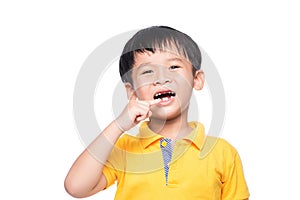 Lost milk tooth asian boy, Close up view.