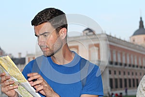 Lost tourist using map during vacation