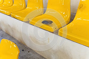 Lost wallet lying on a stadium seat