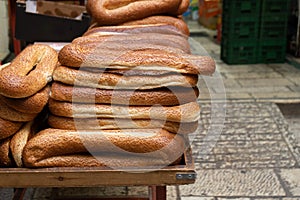 A lot of arabian bread bagele on the street counter in old Jerusalem, Israel