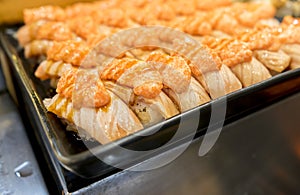 Lot of beautiful grilled salmon sushi