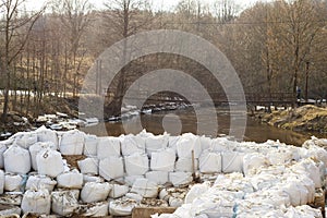 Lot of big sandbags for flood defense.