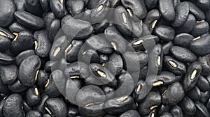 A lot of black beans raw, Organic grains food, Texture background, Top view.