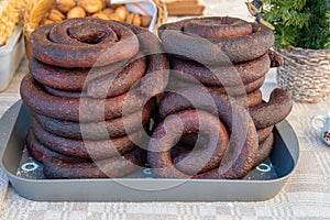 A lot of blood sausage, top view. Background from homemade sausage. Homemakers' Market photo