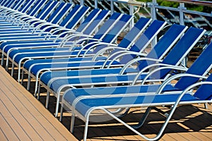 A lot of blue sunbed into a cruise ship