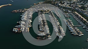 A lot of boats and yachts on the pier in the harbor. Aerial view of Milta marina bay in Bodrum, Turkey