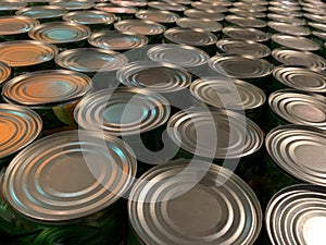 A lot of canned goods at the grocery store. Background texture: round cans, preservation