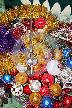 A lot of Christmas decorations of balls and toys, preparation for the holiday