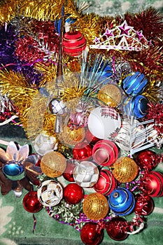 A lot of Christmas decorations of balls and toys, preparation for the holiday