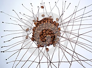 Coffeebeans on a  table painted with coffee