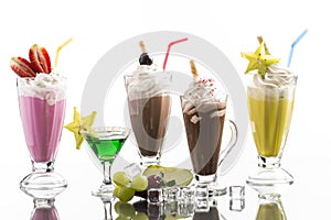 lot of cold frappes with absinth cocktail on the bright background photo