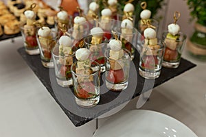 a lot of cold snacks on buffet table, catering.