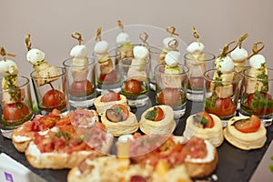 a lot of cold snacks on buffet table, catering.