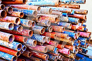 A lot of colored iron metal pipe