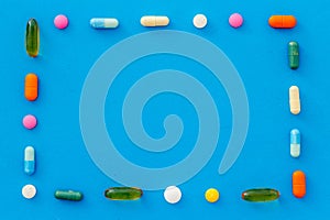 A lot of colorful medication pills drugs, top view