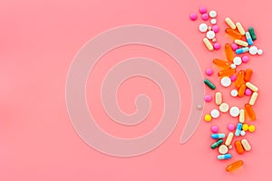 A lot of colorful medication pills drugs, top view