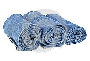 Lot of different jeans isolated on white background