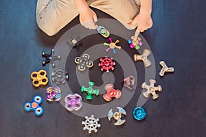 A lot of different spinners on a black background