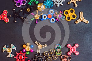 A lot of different spinners on a black background