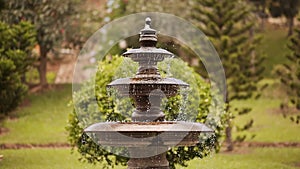 A lot of drops of water fountain with a murmur flow down. Close-up