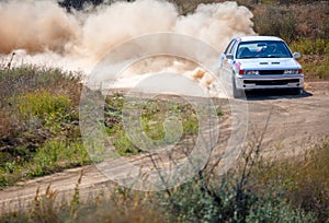 Lot of Dust on a Sharp Bend From a Rally Car